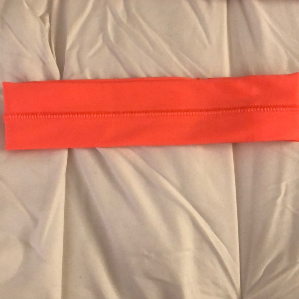 Neon pink athletic headband